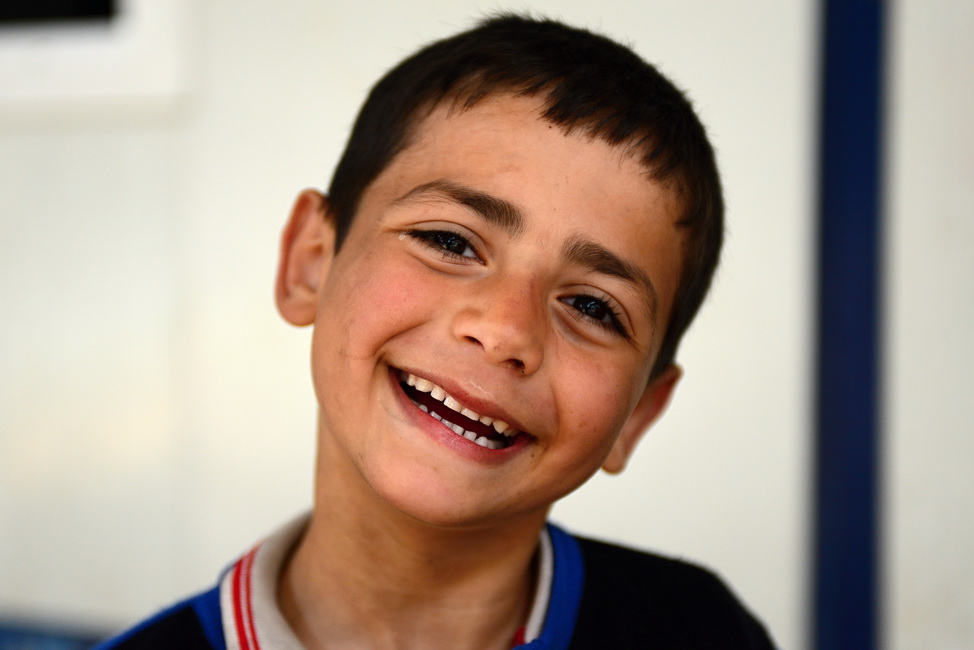 Series of portraits of children syrian refugees